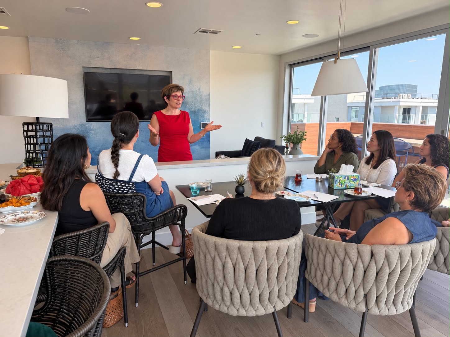 Women participating in a guided group session with Mehri